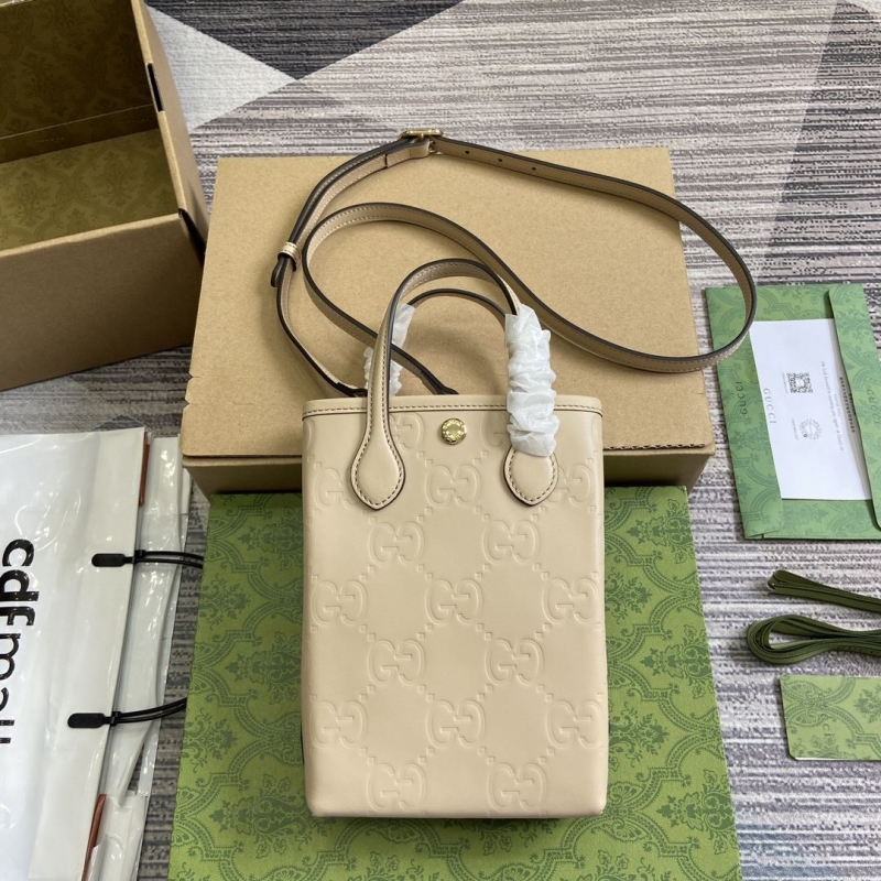 G*u*i top handle bags